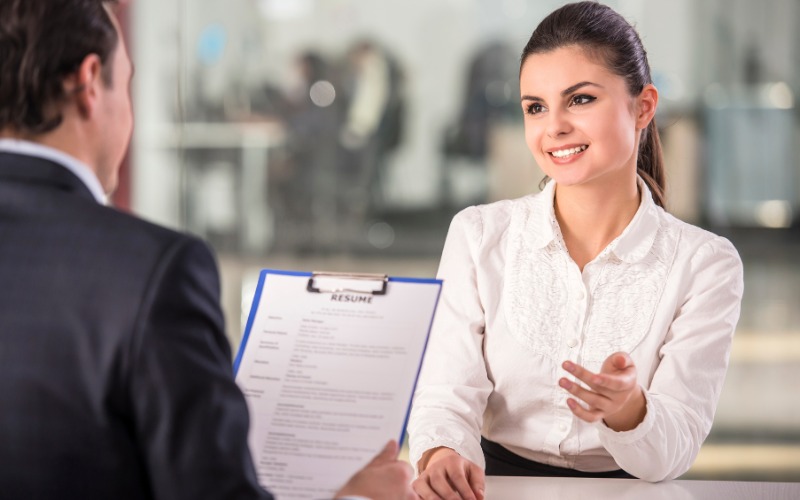 An image of a person interviewing a house helper candidate