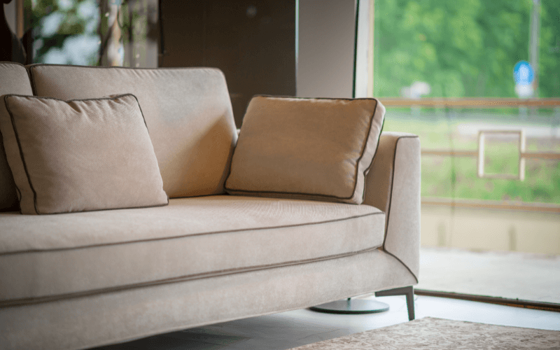 An image of a sofa with natural fabric