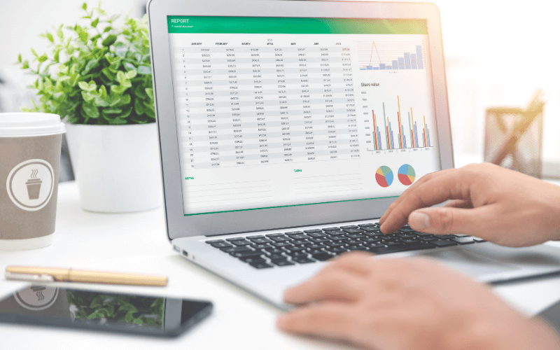 A desk with a budget spreadsheet