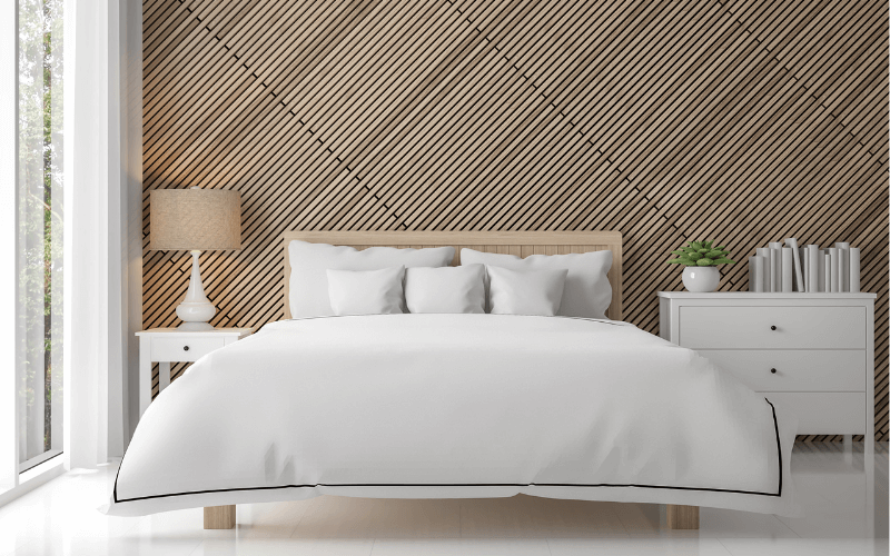 An image of a bedroom with a wood-panelled wall