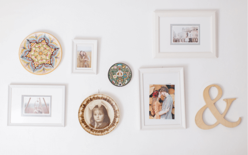An image of a wall with family photos