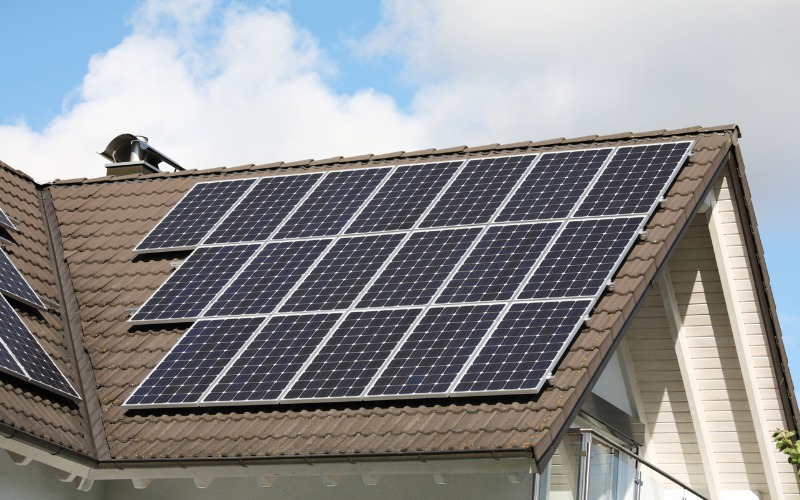 An image of solar panels on a roof