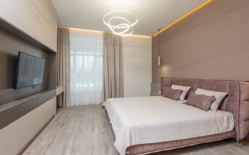Image of a queen-size bed in a master bedroom