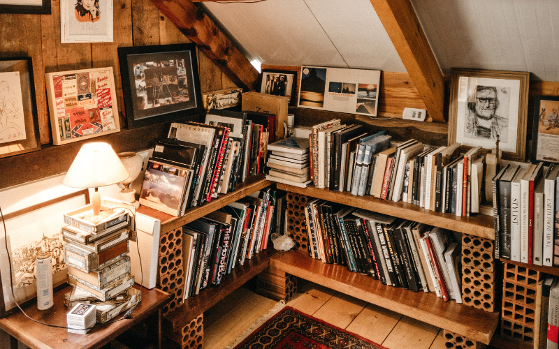 Image of bookshelves filled with books and decorations