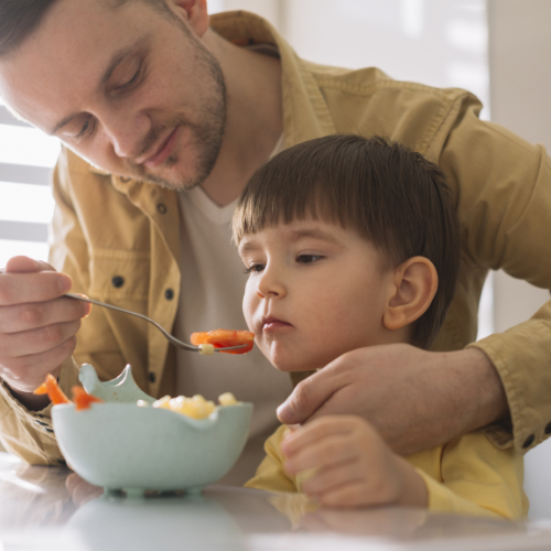 Small image of a parent hiding vegetables in a meal