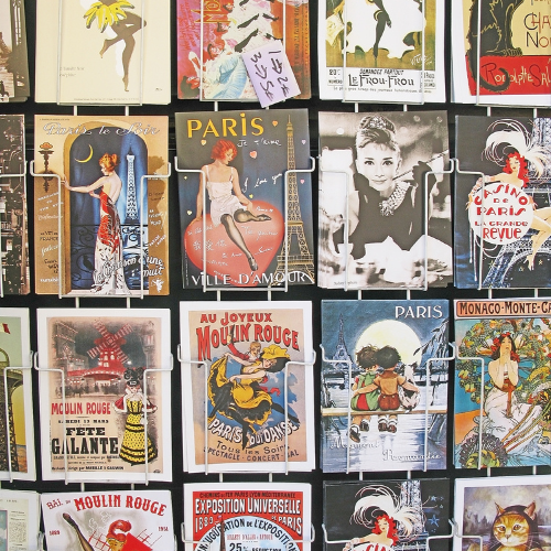 Small image of a wall of movie posters and a snack table