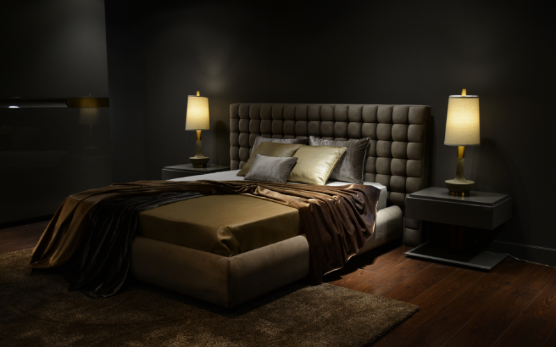 A black and gold bedroom interior
