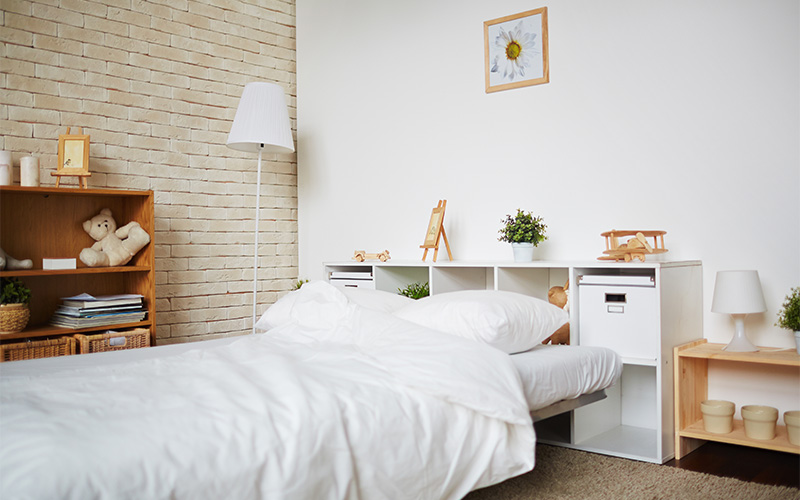 A stock photo of an HDB bedroom.