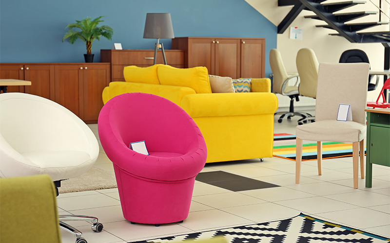 An image of a room with bright-colored furniture