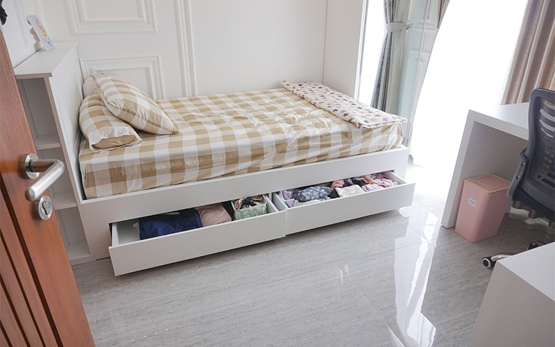 Image of a bed with built in storage