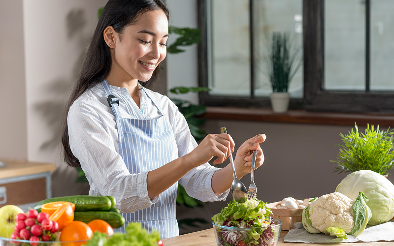 Image of a person preparing ingredients on a kitchen island