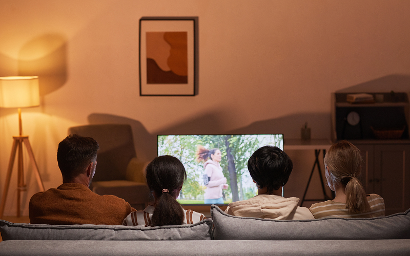 A family watching TV.