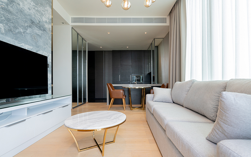 A stock photo of a minimalist HDB living room.