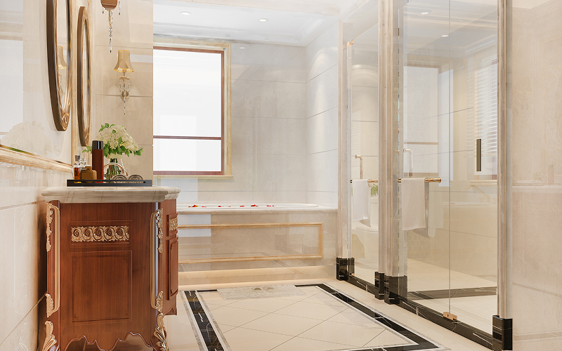 An HDB bathroom with grab bars and anti-slip flooring