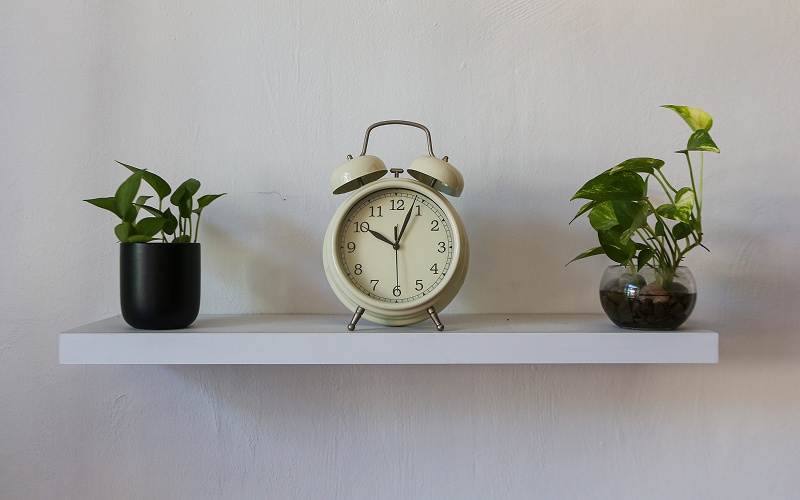A stock photo of a floating bedside shelf.