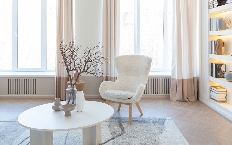 a bright living room with a minimalist yet cosy look.