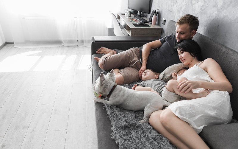 a family bonding in a minimalist living room.