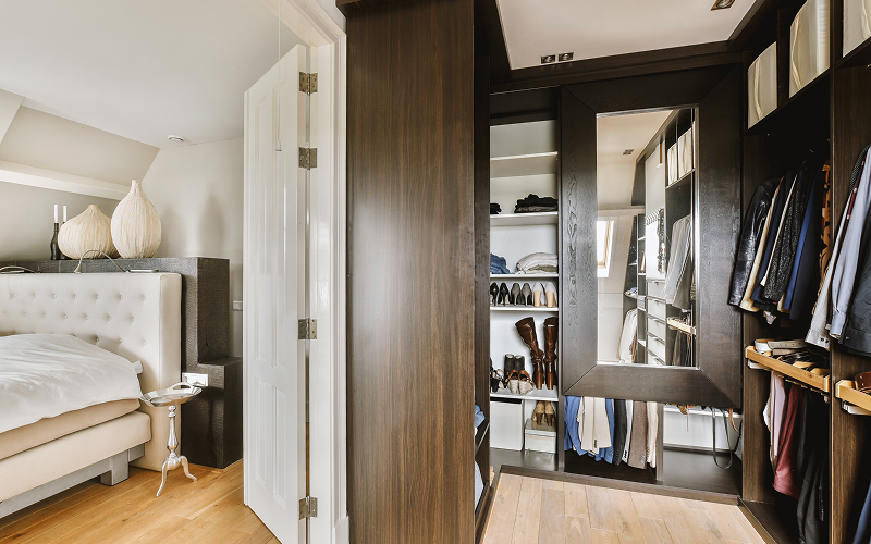 An interior of a walk-in wardrobe