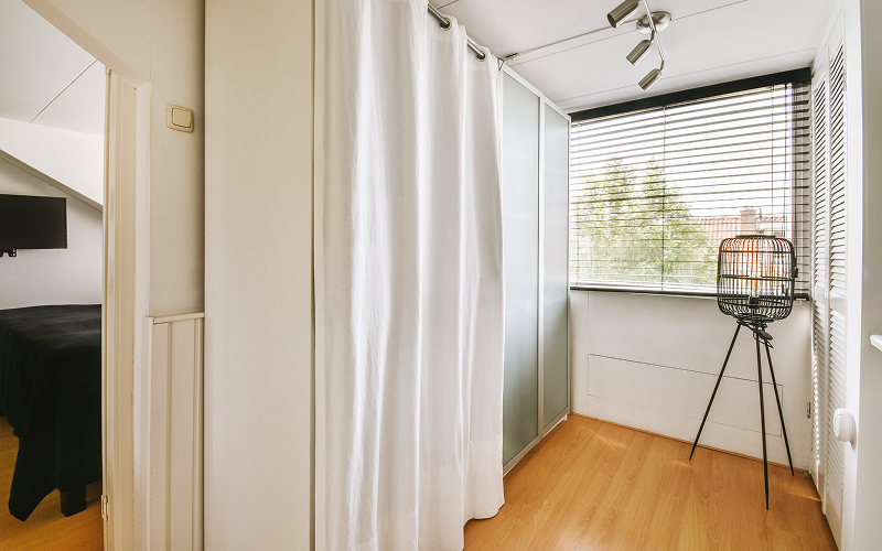 well-placed fabriccurtain divider inside a room