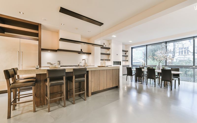 a simple-coloured, minimalist kitchen layout