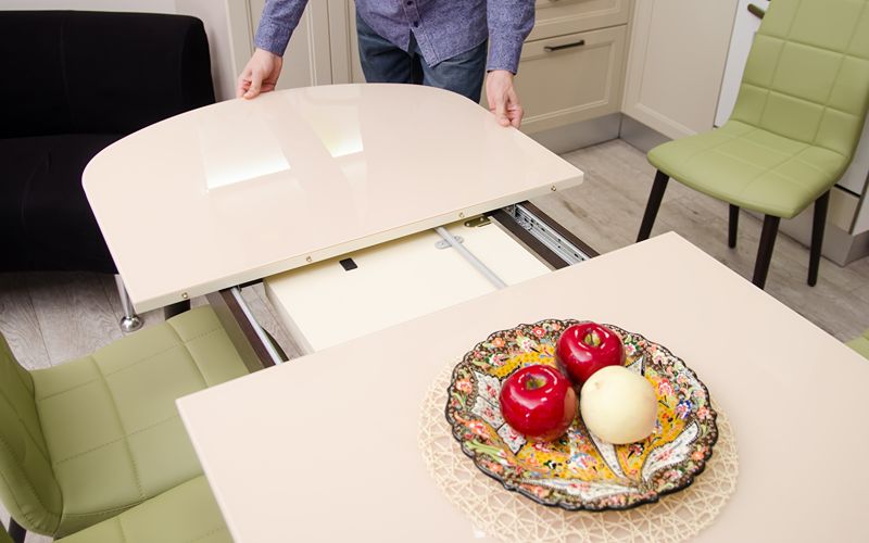 a small image of an expandable dining table