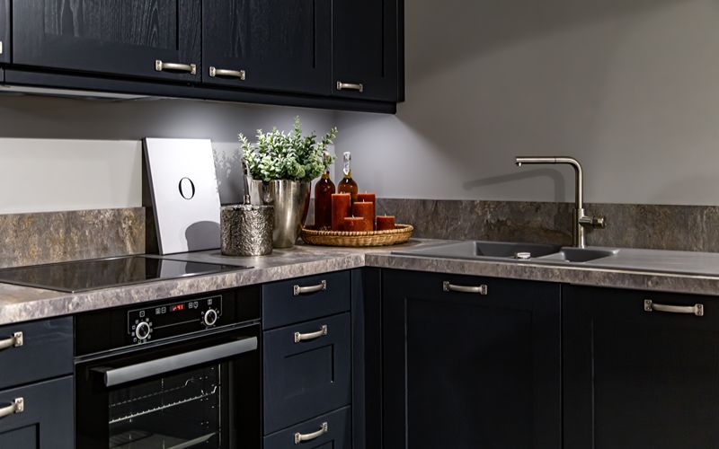 Image of a kitchen island with a stone countertop