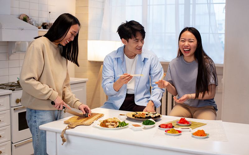 Image of a people chatting at a kitchen island