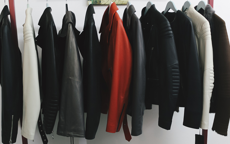 A variety of jackets in a wardrobe