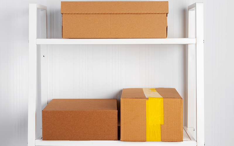 Image of a shelf with storage boxes