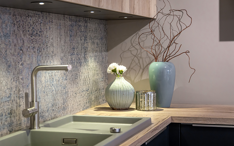 An image of pendant lights above a sink