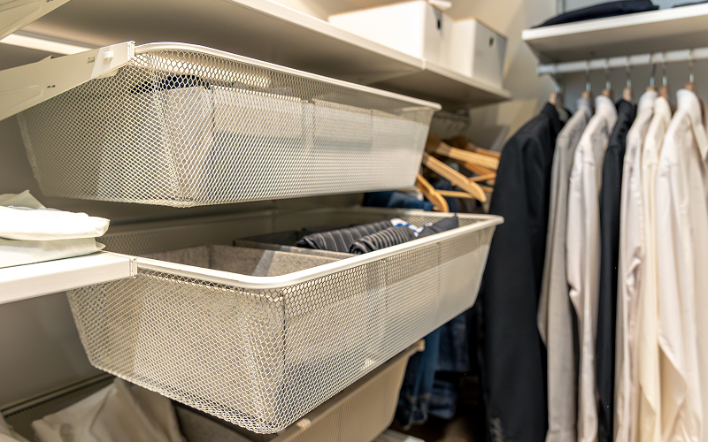 Image of a wardrobe with storage boxes