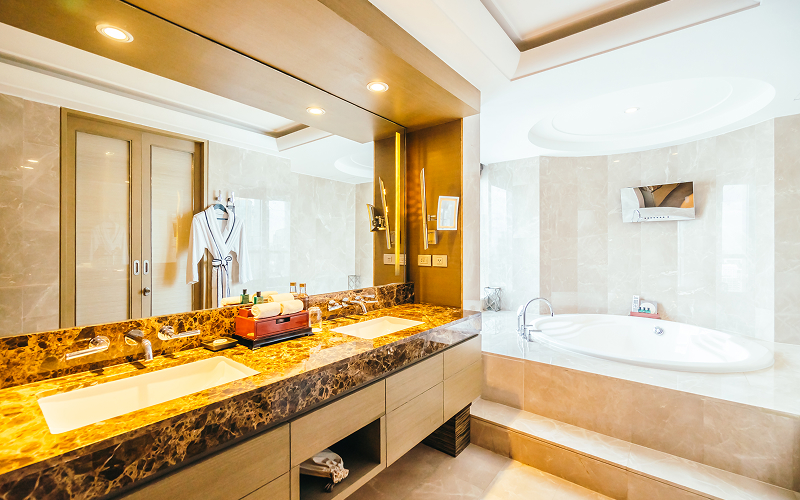 a well-lit, luxury bathroom